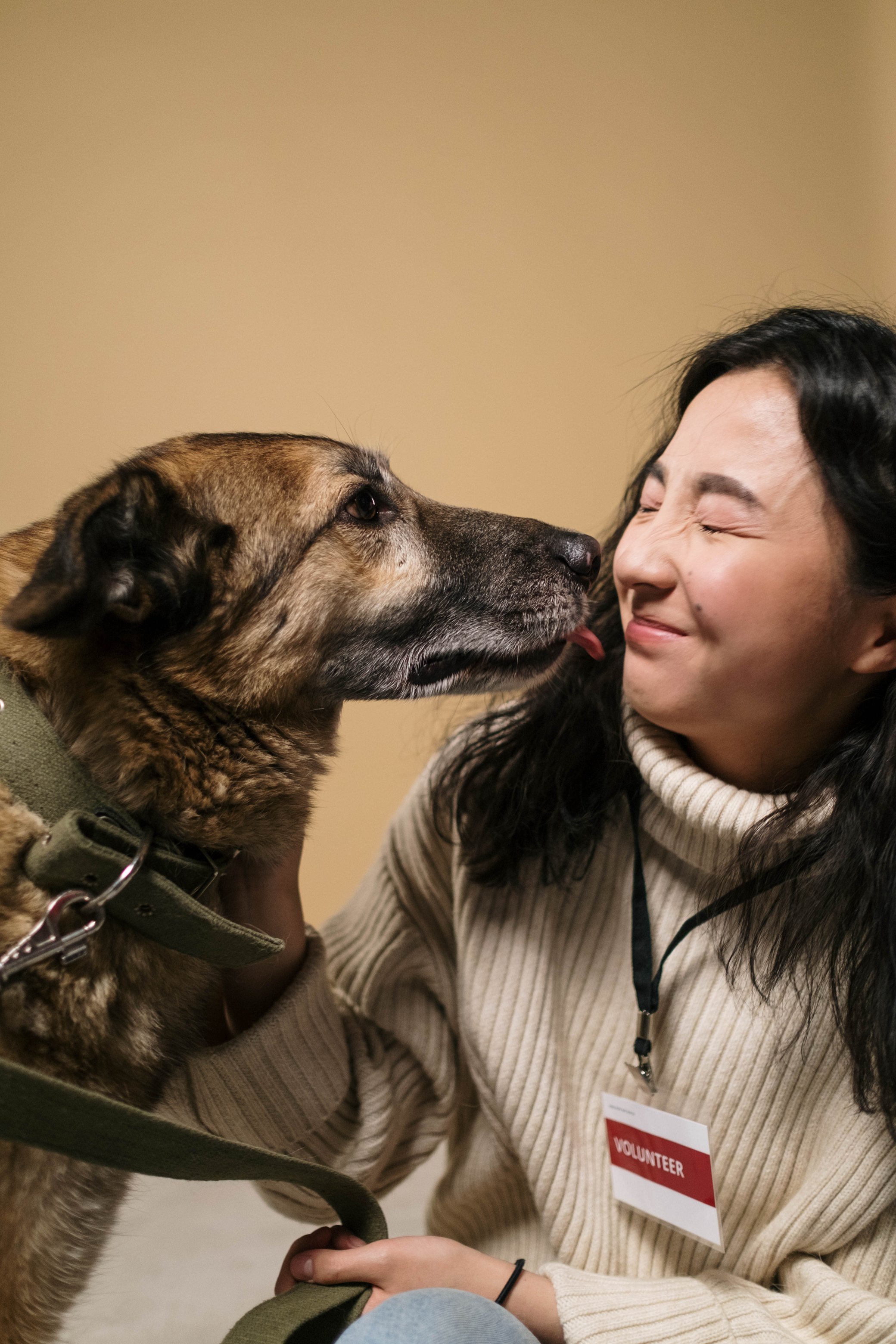 A Woman Playing with Her Dog